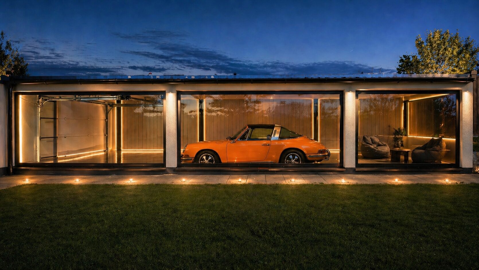 Verglaste Showroom-Garage, nachts wie eine Vitrine beleuchtet